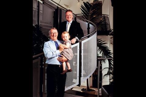 The Wates family have had their business for 111 years. Pictured are Andrew (left) and James Wates with little Emily
